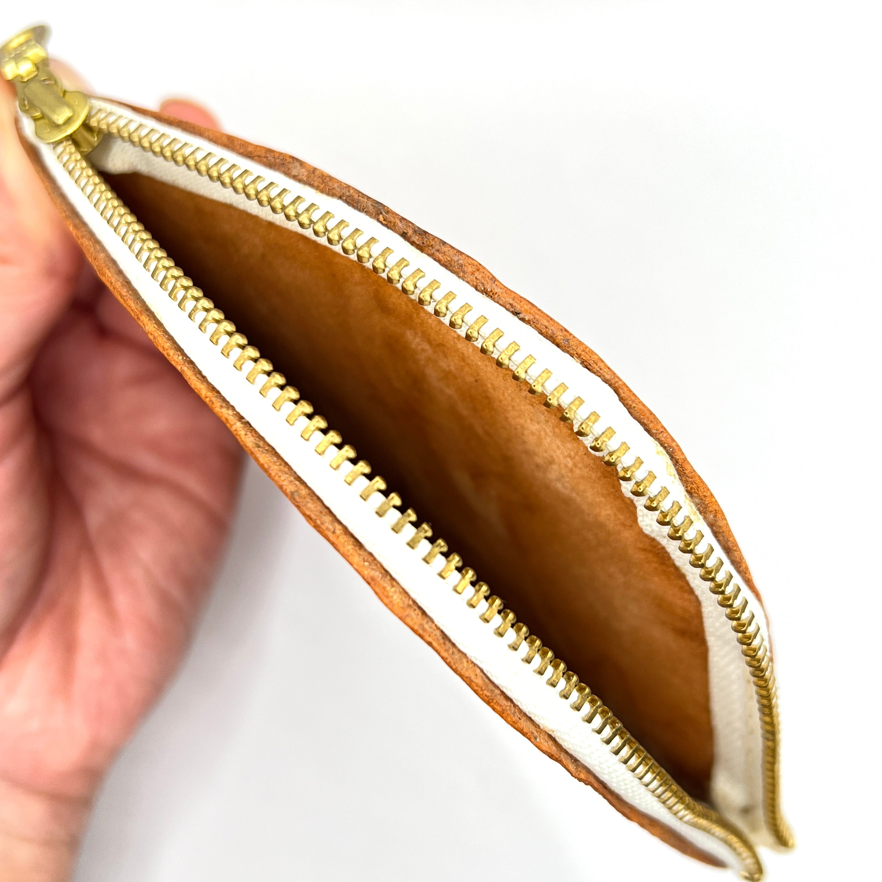 Carved Genuine Leather Zip Pouch